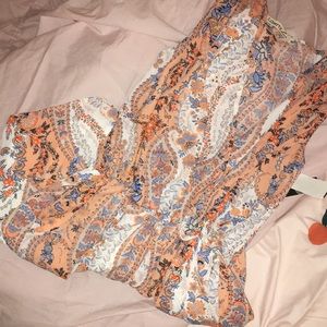 Orange and white printed romper 🍊✨